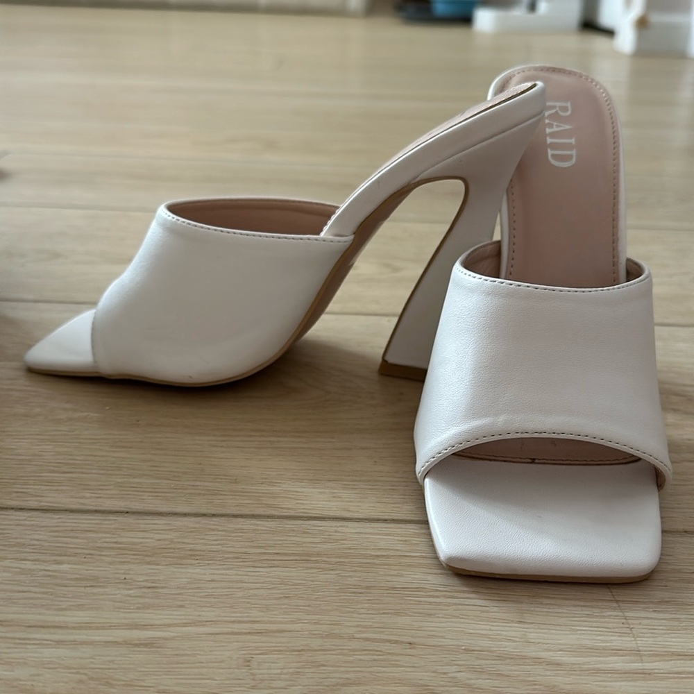 Worn once white heals